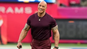 Dwayne Johnson smiling with film and business imagery representing his net worth